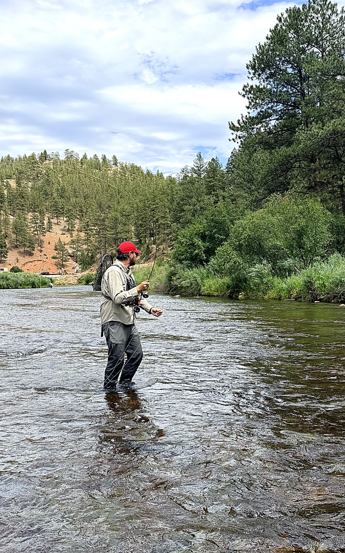 Mid-cast with the Gallatin, net on my back, the line unrolling behind me — an ordinary afternoon on the Platte